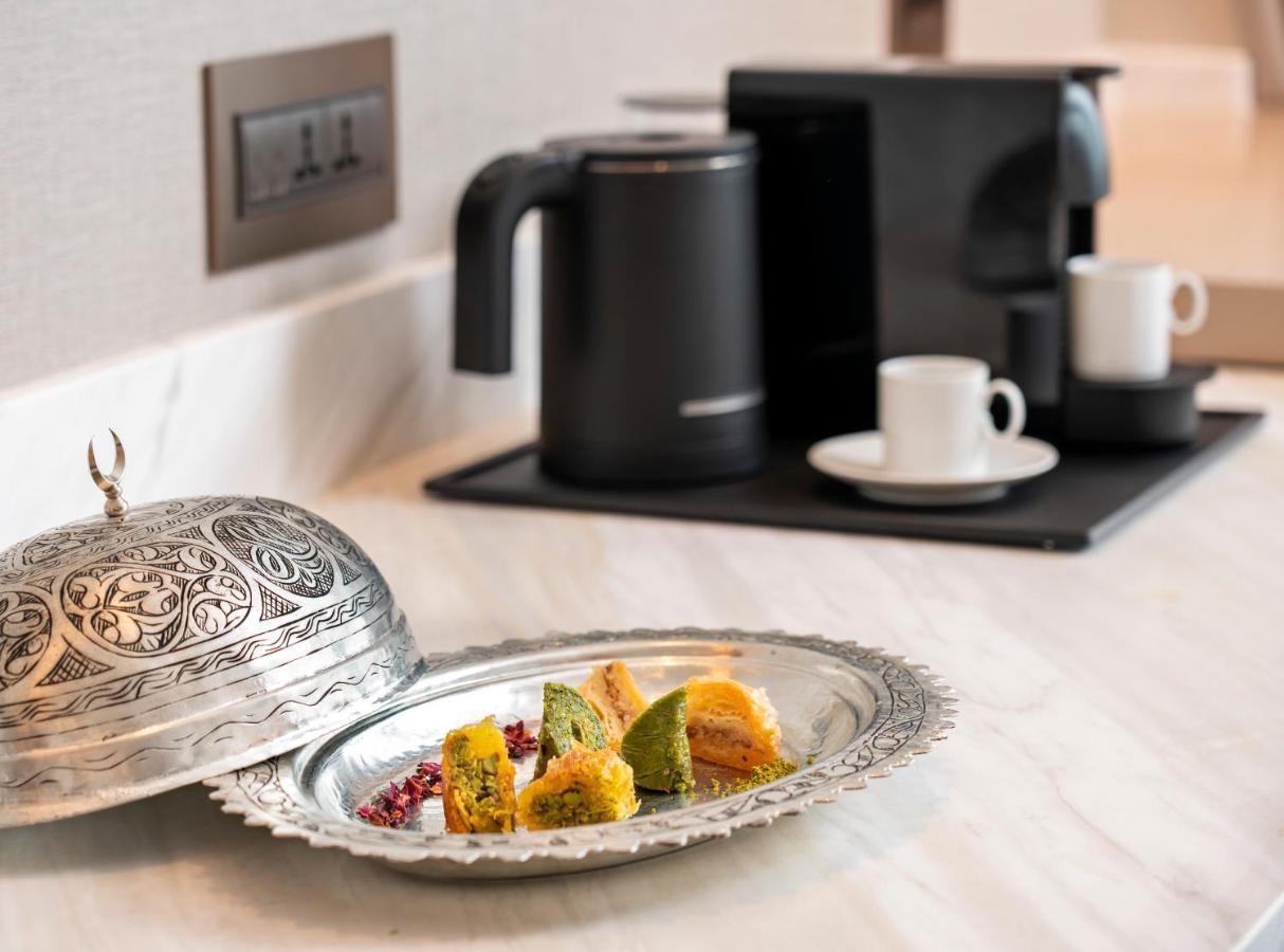Address Istanbul Hotell Eksteriør bilde A coffee machine in a hotel room
