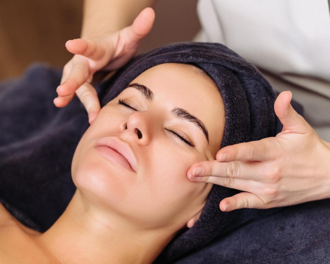 Address Istanbul Hotell Eksteriør bilde A woman receiving a facial massage